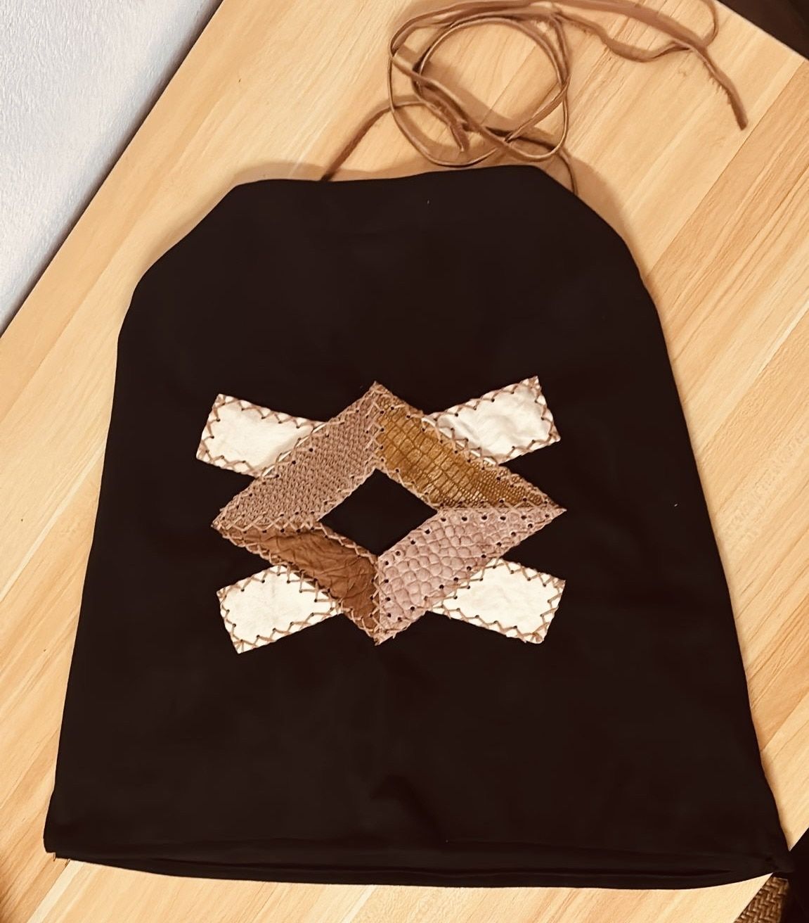 Top Suede geometrico