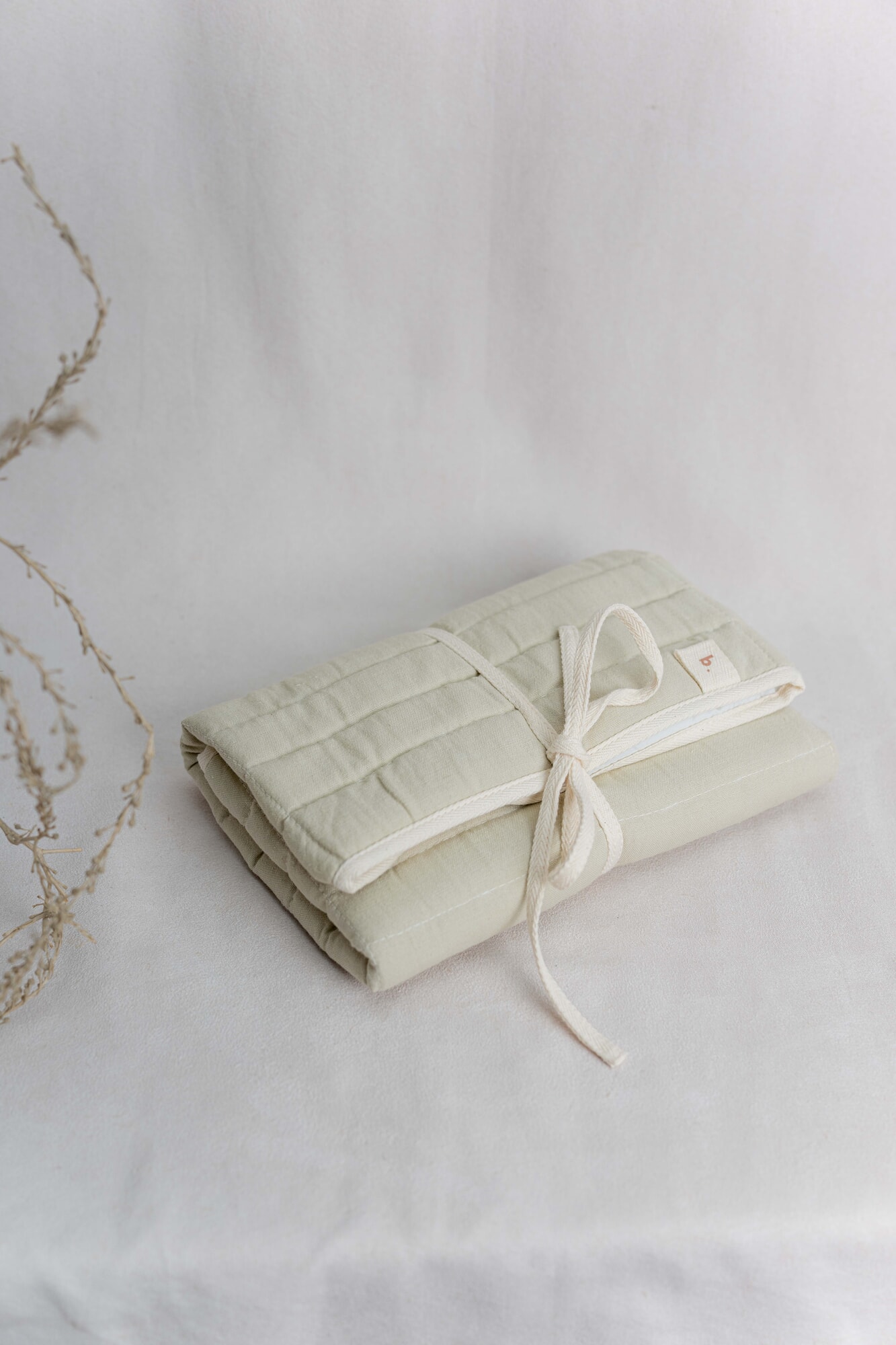 Cambiador de viaje capitoneado