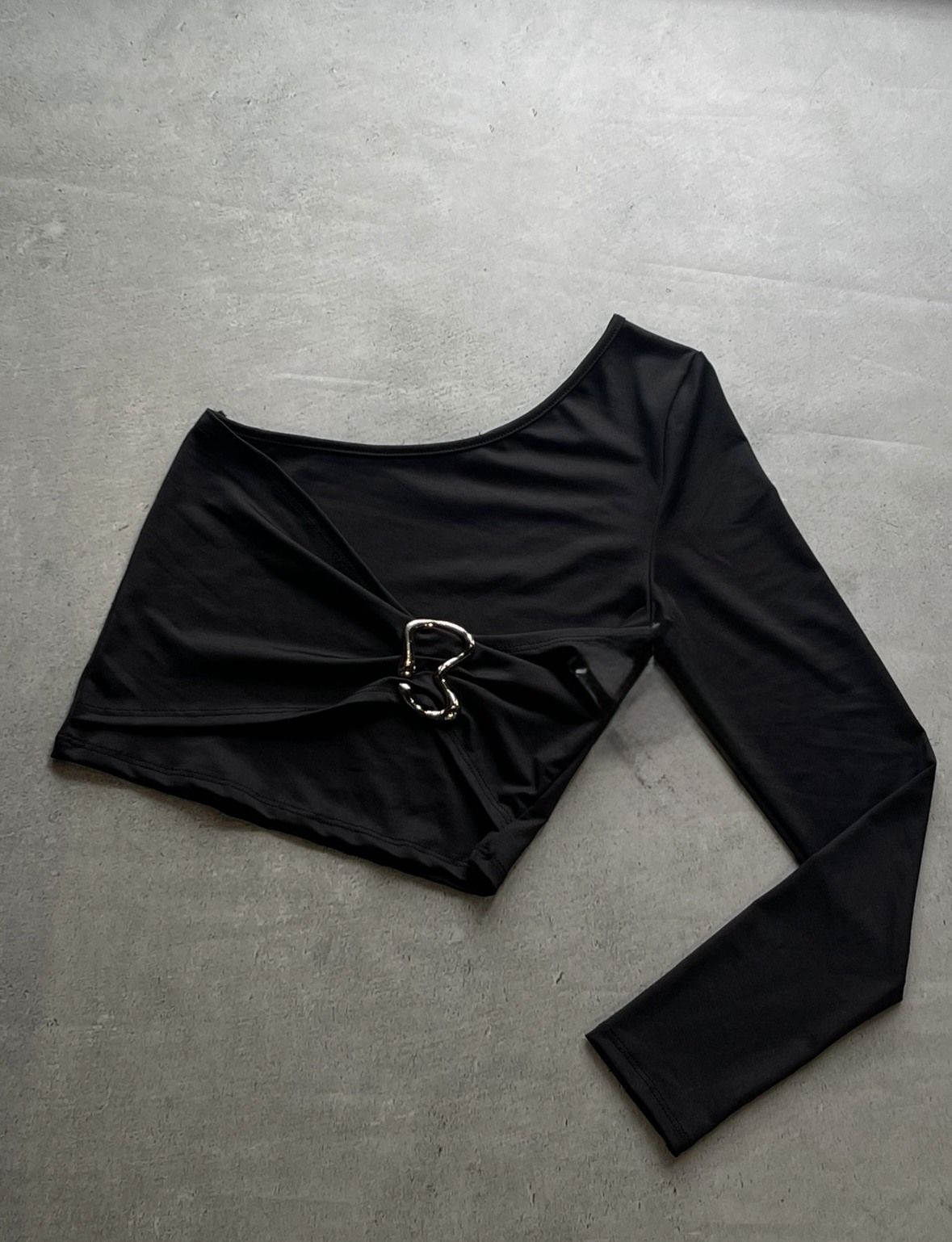 Top irregular hebilla