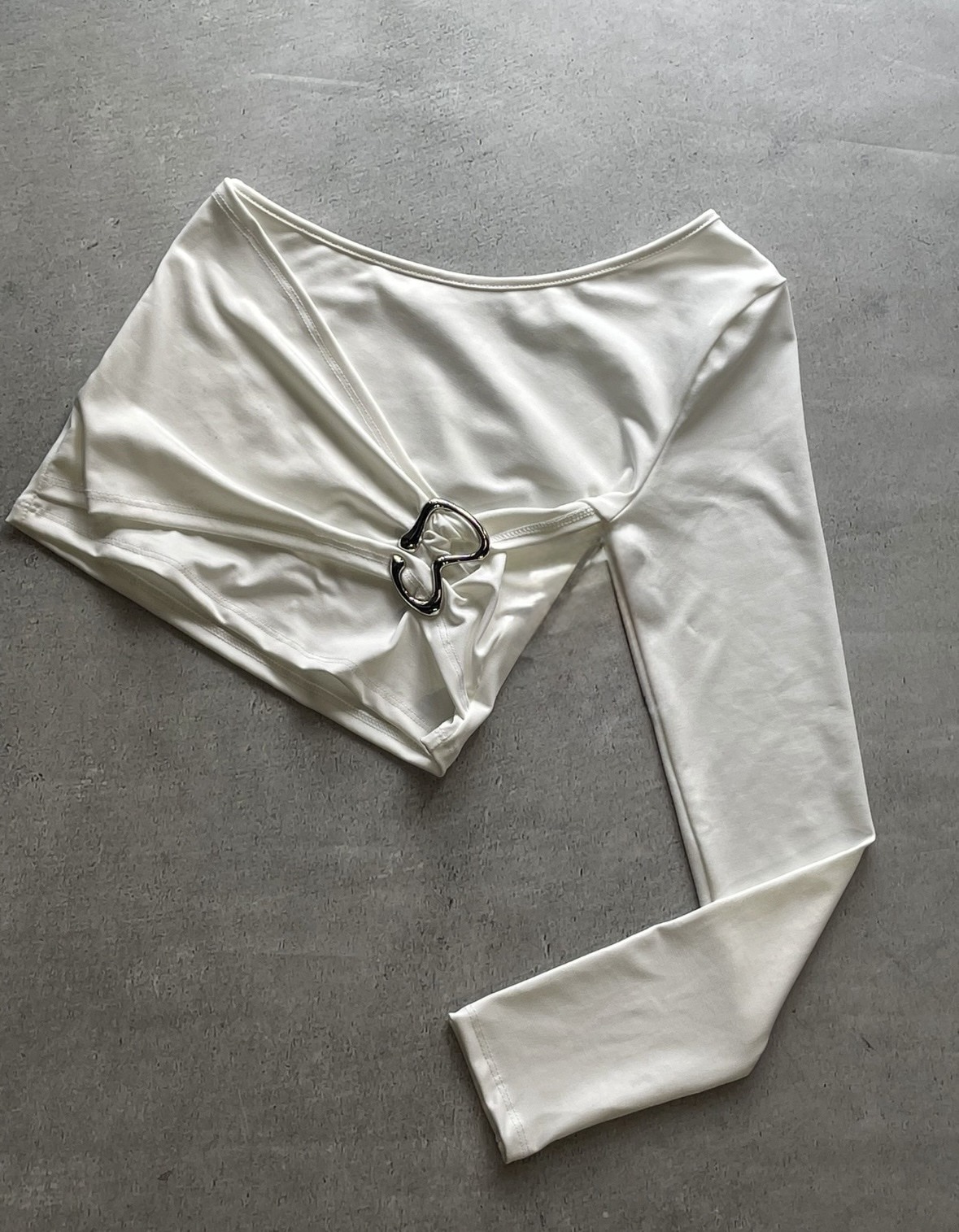 Top irregular hebilla
